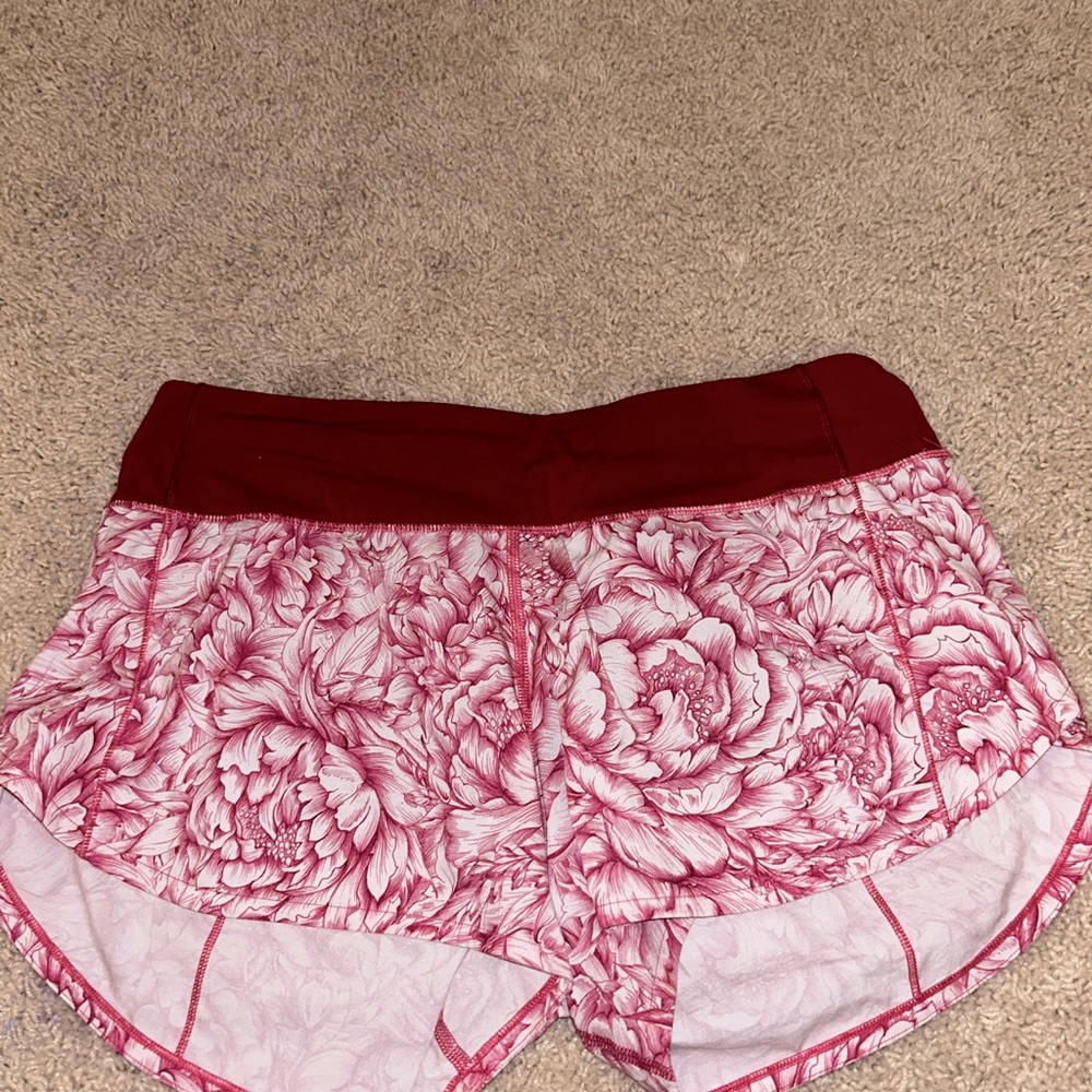 Pink floral lululemon speedup shorts